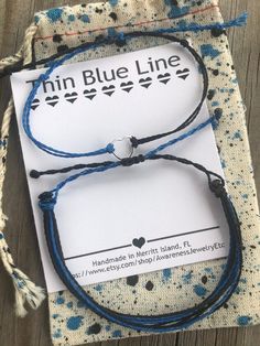 HIS & HER FRIENDSHIP BRACELET - THIN BLUE LINE WAXED POLYESTER BRACELET The perfect Gift to show your appreciation for a Police Officer. Listing is for ONE SET of 2 MATCHING Bracelets or you can purchase ONE individual Bracelet. Matching Gifts for Him and Her. Waxed Polyester Waterproof Friendship Bracelets in Black and Blue - Simple, Cute bracelets to wear everyday! The perfect bracelet to wear to the beach and stack with your other favorite bracelets. One-Size-Fits-Most (If your are Extra Police Bracelet, Polyester Bracelet, Police Girlfriend, Police Mom, Bracelet Matching, Bracelet Cord, Police Gifts, Police Wife, Matching Gifts