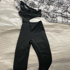 Never Worn! Casual Black Bodysuit For Parties, Black Evening Jumpsuits And Rompers, Black Evening Jumpsuit, Black Cutout Bodysuit For Spring, Black Fitted Jumpsuits And Rompers, Black Jumpsuit Overall For Night Out, Chic Black Overall Bodysuit, Black Overall Jumpsuit For Night Out, Trendy Black One-piece Jumpsuit