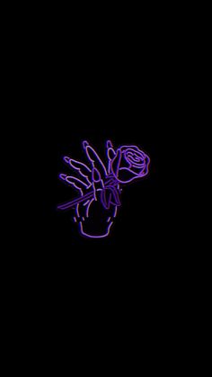 a black background with a purple outline of a hand holding a flower in the center