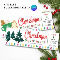 two christmas movie night tickets sitting on top of a table next to evergreens and red berries