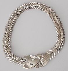 The sterling silver necklace in the form of a fish head and articulated 'bones' measures about 18 3/4 inches in length and 13/16 inch in width.  The head measures about 1 3/4 x 1 5/16 inches.  The tail measures about 1 15/16 x 1 3/8 inches.  Stamped "TH90  MEX 925".  The matching drop pierced earrings measure about 2 1/16 x 9/16 inches.  Weight about 7.0 ounces total. x Fish Head, Sterling Necklaces, Necklace And Earrings, Pierced Earrings, Sterling Silver Necklace, Earings Piercings, Sterling Silver Necklaces, Jewelry Sets, Bones