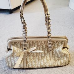 100% Authentic Vintage Christian Dior Diorissimo Trotter Romantique Shoulder Bag Beige And White With Silver Chain Handle 14" X 7.5" X 5" Preowned Condition With Flaws Interior Fabric Is Mostly Clean But Leather Has Minor Marks Exterior Has Chipping Of Majority Of Leather Piping (See Photos) And Some Stains/Marks Handles In Good Condition White Monogram Canvas Bag For Formal Occasions, Dior Romantique Bag, Elegant Monogram Canvas Bags For Formal Occasions, Dior Bag Outfit, Dior Vintage Bag, Vintage Dior Bag, Thrifting Ideas, Dior Diorissimo, Vintage Designer Handbags