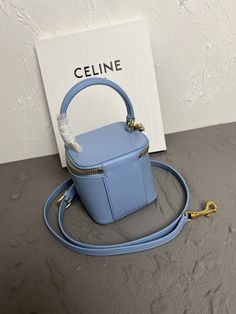 CELINE (9.5x8X9 cm) This model cannot accommodate smartphone models. Cow leather
Lining: Cow leather/fabric Hand, shoulder and cross-body zip closure 1 main compartment
Adjustable and removable leather shoulder strap drops 22" (55cm) Leather handle drops 3" (7cm) High-end Blue Box Bag With Detachable Handle, Luxury Blue Shoulder Bag With Zipper, Luxury Bucket Shoulder Bag With Zipper Closure, Luxury Crossbody Box Bag With Zipper, Luxury Square Box Bag With Zipper Closure, Mini Vanity, Lv Purse, Lv Shoes, Vanity Case