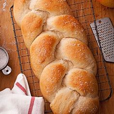 a loaf of bread sitting on top of a wooden table