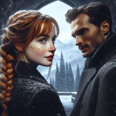 a man and woman standing next to each other in front of a snow covered forest