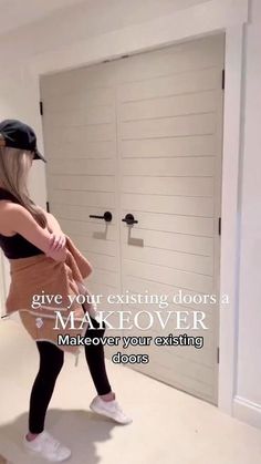 a woman standing in front of a door with the caption give your existing doors a makeover