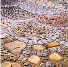 an image of a cobblestone walkway that looks like it is made out of stones