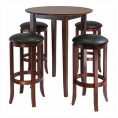 three stools and a table with two barstools