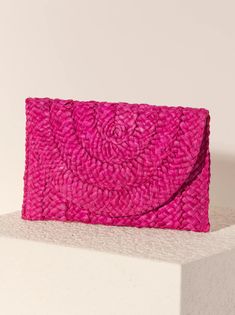 Style your look with this unique pink luxury! The Pink Simonetta Clutch by Shiraleah has all the flair you need with its chic corn husk material and magnetic closure, perfect for keeping your essentials intact. Rock it with elegance or have a little fun – you choose! ~~Fashionably corn-tastic!~~ Color: Pink L 11" X W 1" X H 7" Material: Corn Husk Magnetic Snap Closure Made In China Vegan Pink Luxury, Corn Husk, Pink Accessories, Next Fashion, Neutral Outfit, Clutch Handbag, Bold Colors, Warm Weather, Snap Closure