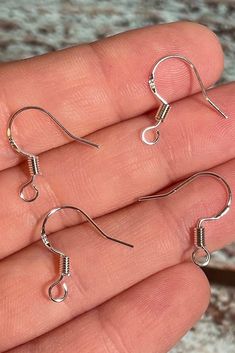 16mm in size and 24 gauge thickness. Made from .925 sterling silver and .75 copper. These earring hooks are .925 stamped and are bendable but durable. You will need to straighten out many hooks upon arrival but by laying them on a flat surface and pushing them flat. Light weight earring hooks like these are so versatile for your earring creations or if you are wanting to update your current earring hooks to a more hypoallergenic earring hook! Pair these with silicon earring backs: https://www.et Earring Hook, Hypoallergenic Earrings, Earring Hooks, Light Weight Earrings, Silver Earring, Earring Backs, Flat Surface, Ear Wires, Jewelry Supplies