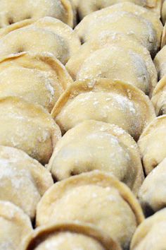 several pastries are arranged in rows on a table