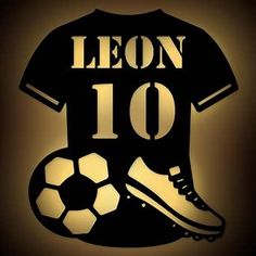 a black and yellow soccer jersey with the number 10 on it, next to a soccer ball