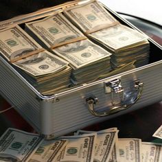 a briefcase full of money with the words my lunchbox be like