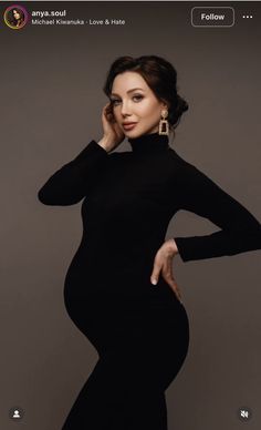 a pregnant woman in a black dress posing for the camera with her hand on her hip