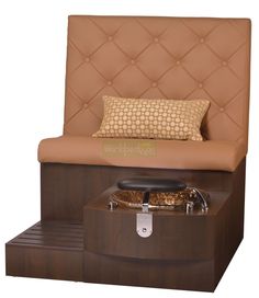 a brown chair with an ottoman underneath it