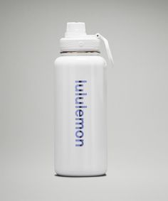 a white water bottle sitting on top of a table