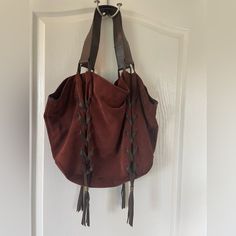 Used 1-2 Times Heavy Suede And Leather Hobo Bag Excellent Condition!! Brown Leather And A Kinda Burnt Orangie Maroon Suede Bucket Bag With Leather Handles, Leather Trim Hobo Shoulder Bag For Shopping, Leather Trim Satchel Hobo Bag For Shopping, Luxury Suede Hobo Bag With Leather Handles, Shopping Hobo Bag With Leather Trim Satchel, Suede Hobo Bag With Leather Handles For Shopping, Luxury Suede Hobo Tote Bag, Luxury Suede Hobo Bag For Shopping, Shopping Hobo Bag With Double Handle And Leather Trim