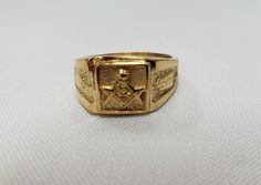 SOLID 14K CLASSIC GEOMETRIC MASONIC LODGE RING * SIZE 7.5 A CLASSIC GEOMETRIC COMPASS & SQUARE SYMBOLS of MASONIC LODGE  * Solid 14k Yellow Gold  * Ring Weight : 11.7 grams  * Ring Size:  7.5 *  Very Good Pre-owned Condition * Some minor marks SOLD AS FOUND SEE PICTURES FOR BETTER CONDITION DETAILS  +++ Color may vary slightly depending on your monitor settings +++ Geometric Compass, Masonic Lodge, Yellow Gold Ring, Ring Size 7, Yellow Gold Rings, Compass, Gold Ring, Gold Rings, Jewelry Watches