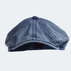 the back of a denim cap on a white background