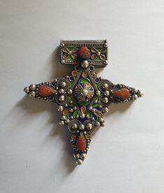 Morocco - Mauritania - Rare large cross "Boghdad" in sterling silver, enameled and coral beads Height: 95 mm Width: 90 mm Weight: 53.40 grams Feel free to contact me for any question about this item, I will be happy to answer you as soon as possible Visit my Etsy Shop: https://www.etsy.com/fr/shop/TIFINAGH Traditional Handmade Crucifix Jewelry, Traditional Cross Pendant Large Jewelry, Traditional Cross Pendant For Ceremonial Occasions, Traditional Handmade Cross Jewelry, Algerian Jewelry, Berber Jewelry, Moroccan Jewelry, Coral Beads, Creative Jewelry