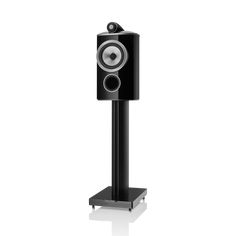 a black speaker stands on a white background