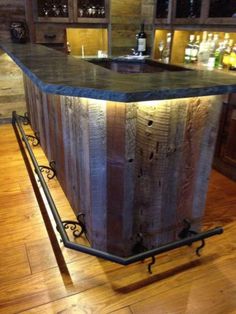 a wooden bar with metal bars on top