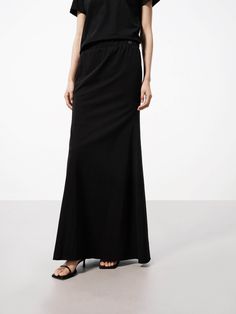 MO&Co. Women's Distressed Jersey Maxi Skirt Crafted from a soft cotton blend with just the right amount of stretch, this maxi skirt feels as good as it looks. The inclusive design makes it a must-have addition to any wardrobe. It has an elasticated waistband that provides a flexible and forgiving fit, and distressed details add a trendy, lived-in look to the skirt, giving it a casual and relaxed vibe. Features : - Inclusive maxi A-line silhouette- Elasticated waist, distressed details- Stretchy Chic Solid Cotton Maxi Skirt, Chic Maxi Dress With Relaxed Lined Skirt, Chic Relaxed Fit Maxi Skirt, Spring Long Inseam Flowy Skirt, Black Voluminous Cotton Maxi Skirt, Black Cotton Maxi Skirt With Elastic Waistband, Relaxed Full-length Cotton Maxi Skirt, Flowy Maxi Skirt With Long Inseam For Spring, Chic Stretch Long Maxi Skirt