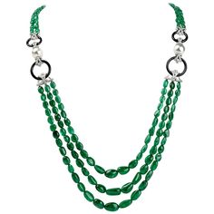 Fell the prestige of this glamorous and elegant Diamond Emerald Pearl & Onyx 18K Gold Multistrand Bead Necklace!  This beautiful necklace is crafted in 18-karat white gold, with a lobster clasp and adjustable links for length variation.  It displays two 11-millimeter genuine pearls with high luster and minor blemishes, on both side of the necklace.  Above and below the heavenly pearls are four genuine onyx circle motifs.  There are also eight gold scroll designs encrusted with sparkling genuine 1stdibs Jewelry, Moms Bracelet, Emerald Bead, Multi Strand Necklace, The Prestige, Multi Strand, Bead Necklace, Beautiful Necklaces, Jewelry Art