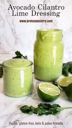 avocado cilantro lime dressing recipe in a jar and sliced limes