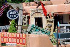 an assortment of furniture and decorations in front of a santa feliz kilim sign