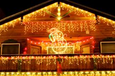 a house covered in christmas lights and decorations