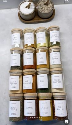 spices and seasonings are arranged on the counter for sale in a store window display