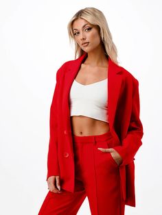 This red wide leg pantsuit screams luxury and class. Featuring a sophisticated silhouette and tasteful pocket detail, this pant suit is perfect for any special occasion. The vibrant red color and delightful fabric blend make it a timeless piece that you'll love for years to come. If you're looking to add a touch of class to your wardrobe, this is the statement piece for you. Wide leg style Pant 33"Inseam Pocket detail