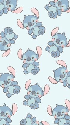 a blue and pink wallpaper with small cartoon animals