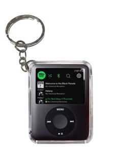 an ipod keychain is shown with the music player on it's side