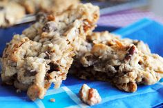 some cookies are sitting on a blue napkin