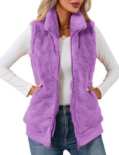 PRICES MAY VARY. ❤Plush and cozy like your favorite blanket but styled for everyday wear, the women's full zipper pockets sherpa fleece vest is a go-to layer for cool-to-cold days at the park or a tailgate. Sleeveless fleece vest jackets for women, causal fleece zip up vest, ladies fleece lounge pockets vest. ❤Features: Womens fall/ winter vest, is made out of fleece, plus hip length, tall, stand-up collar and full, front zipper design which offering plush comfort and warmth, side pockets stash Winter Sweater Vest For Cold Weather, Winter Sleeveless Vest With Fleece Lining, Winter Sleeveless Sweater Vest For Cold Weather, Sleeveless Vest With Fleece Lining For Winter, Sleeveless Sweater Vest For Winter, Cozy Winter Vest For Cold Weather, Fall Fleece-lined Sleeveless Vest, Fall Sleeveless Vest With Fleece Lining, Sleeveless Fleece-lined Vest For Fall