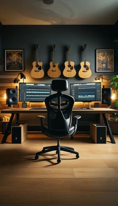 an office with guitars on the wall and desks in front of it at night