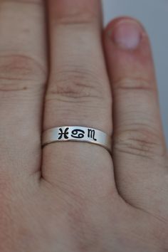 "Is astrology and zodiacs your thing? Then this big three zodiac sign ring is perfect for you. Just enter your Sun, Moon, and Rising sign in the personalization box at checkout. DETAILS: -Each ring is hand stamped -Ring is Sterling Silver -4mm in thickness You will receive one hand-stamped ring filled with a black enamel finish. **Every item is handmade, this means that each will be unique and may not look EXACTLY like the picture, but it will look very similar ➡ORDER PROBLEMS If there are any p Sun Moon Rising, Rising Sign, Stamped Ring, Hand Stamped Ring, Steel Stamp, Moon Rising, Stamped Rings, Big Three, Stacking Ring