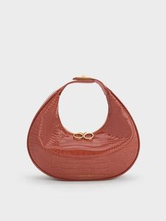 Brown Croc-Embossed Crescent Hobo Bag | CHARLES & KEITH Brown Hobo Bag With Handles For Evening, Brown Hobo Bag For Evening, Elegant Brown Textured Leather Hobo Bag, Chic Hobo Bag With Round Handle, Elegant Brown Hobo Bag With Detachable Handle, Elegant Brown Hobo Bag With Handles, Brown Handheld Hobo Bag For Evening, Trendy Brown Hobo Bag For Evening, Elegant Brown Handheld Hobo Bag