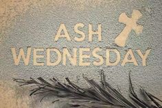 ash wednesday written on the side of a wall with some grass in front of it