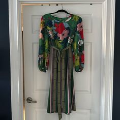 Anthropologie Dress, Size 10, Brand New, Never Worn, With Tags. Beautiful For Holidays. Fully Lined With Green Lining. Wrap Around Belt Attached At Sides. Non Smoking Home. Feels Like Silk. Elegant Patterned Dresses For Spring, Green Midi Length Dress For Casual Wear, Green Floral Knee-length Dress For Brunch, Bohemian Long Sleeve Green Floral Dress, Green Knee-length Brunch Dress, Fitted Patterned Dress For Brunch, Green Floral Print Casual Dress, Elegant Green Midi Floral Dress, Elegant Green Floral Midi Dress