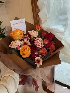 a bouquet of flowers sitting on top of a table