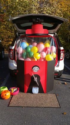 an ice cream machine with balloons in the trunk