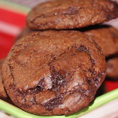 three chocolate cookies stacked on top of each other