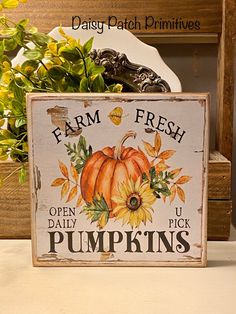 a sign that says farm fresh open daily pick pumpkins