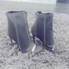 Suede Gray Peep Toe Boot Gray Heels For Spring Party, Gray Party Heels For Spring, Chic Gray Heels For Spring, Gray Medium Width Heels For Spring, Gray High Heel Boots For Spring, Chic Gray Boots For Spring, Chic Gray Spring Boots, Spring Gray Medium Width Heels, Chic Fitted Gray Heels