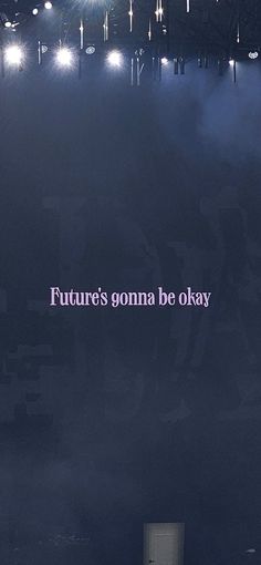 the words future's goma be okay are lit up in front of an empty stage