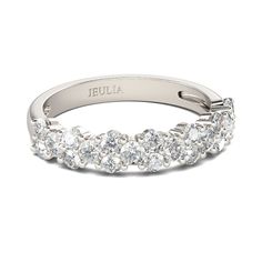 a diamond wedding ring with five stones on the side and an inscription that reads julia