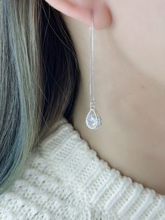 "A pair 925 Sterling Silver dainty long dangling CZ tear drop threader Earrings.  Clear CZ round stone sandwich between 2 teardrops. Large in the front, small teardrop on the back. 925 stamped on the pin. With box chain. A pier silver earrings that is good gift for girl friend, Gift for wife, or a nice gift for mom. It adds a touch of femininity to any outfit. Easy to wear. Simply slide them through your ear and let the chain dangle from behind. The stopper will let them rests on your ear lobe and secures them in place. { -------------------- } Material:                925 Sterling Silver  Length:                  3\" from bottom of tear drop to end of pin Tear Drop width:  1/4\" Tear Drop,Depth: 1/8\" {----------------} Returns & Questions- If there is question or problems after receipt o Cubic Zirconia Long Drop Linear Earrings, Sterling Silver Long Drop Teardrop Earrings For Party, Elegant Hypoallergenic Teardrop Threader Earrings, Silver Long Drop Threader Earrings For Party, Silver Teardrop Linear Earrings With Pearl Drop, Elegant Teardrop Threader Earrings For Wedding, Sterling Silver Teardrop Crown Earrings For Gift, Sterling Silver Drop Linear Earrings For Anniversary, Elegant Long Drop Hypoallergenic Threader Earrings